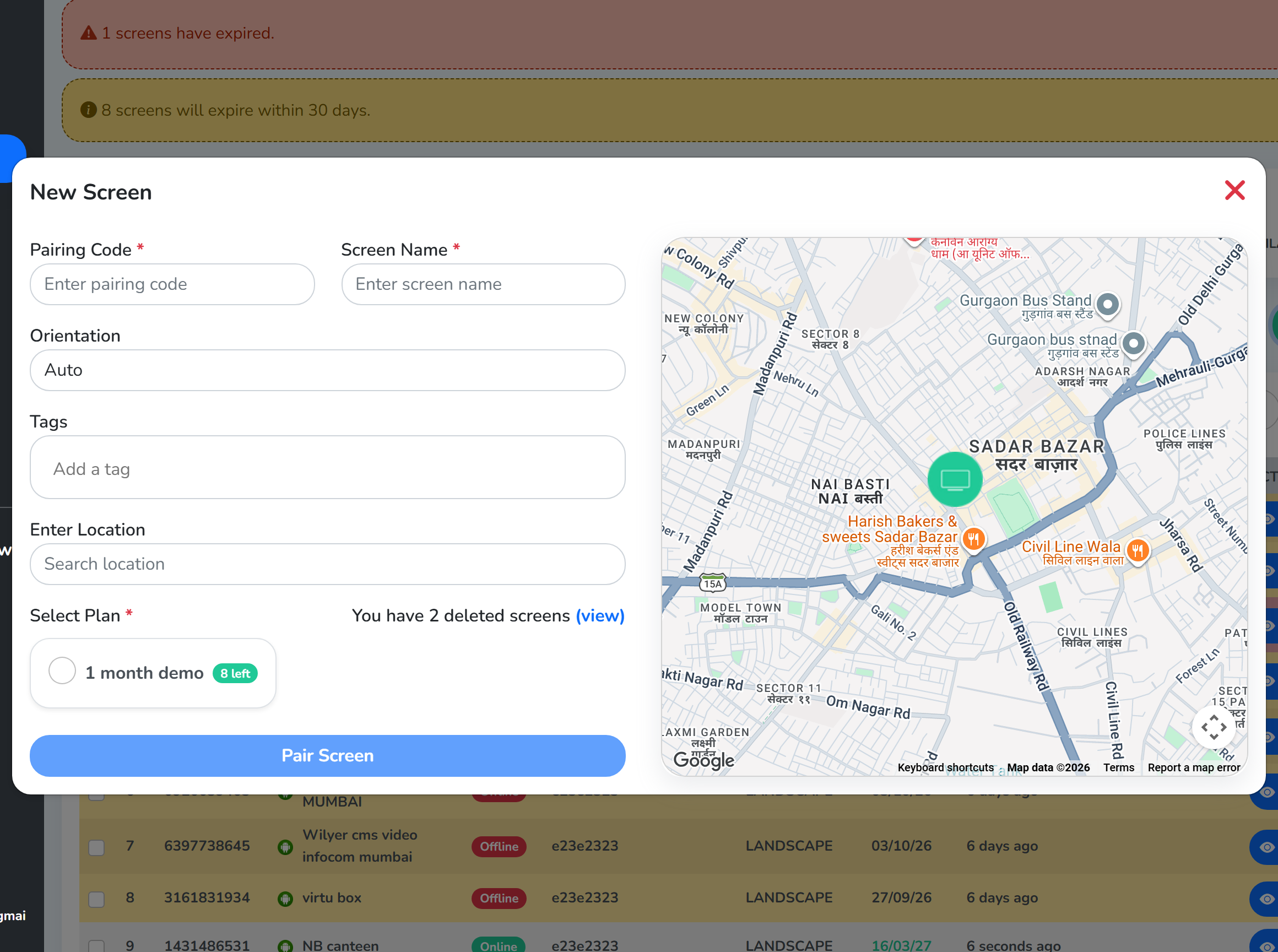 The New Screen window with pairing code 617890 and the name Lobby Display filled in, above orientation, tags, location, the plan picker, the 2 deleted screens link and the Pair Screen button